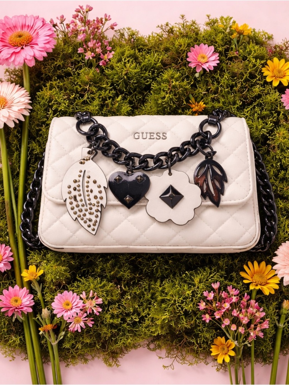 GUESS Cream Quilted Crossbody with Black Chain Charm Details